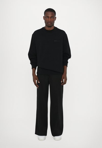 Les Benjamins Παντελόνι φόρμας - black