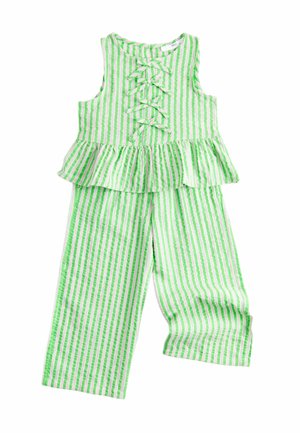 Haut sans manches rayé vert et blanc avec des nœuds et un ourlet péplum, assorti à un pantalon large coordonné.