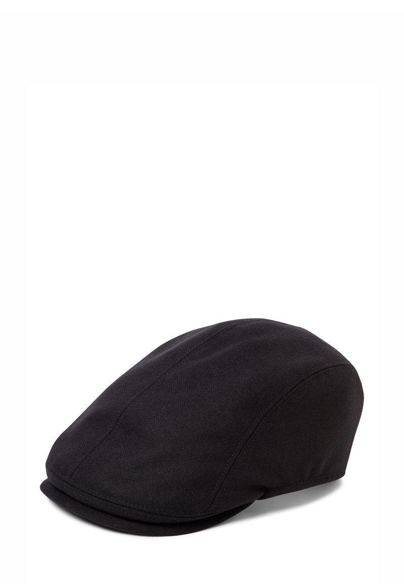 Black cap made of textured fabric, featuring a rounded crown and a short, stiff brim. Seam details are visible along the sides.