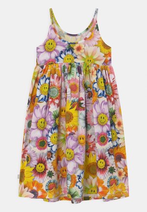 Ärmelloses, farbenfrohes Kleid mit einem Muster großer, mehrfarbiger Blumen, von denen einige in der Mitte gelbe Smiley-Gesichter zeigen.