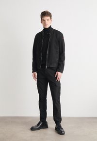 Tommy Jeans ETHAN - Calças cargo - black