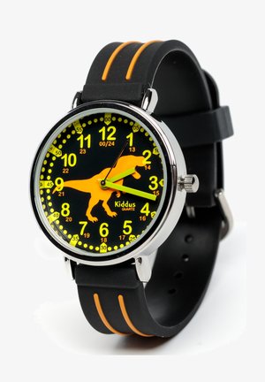 Reloj de silicona negro con detalles en amarillo y naranja. La esfera redonda presenta un silueteado de T-Rex, números grandes y una manecilla de minutos naranja.