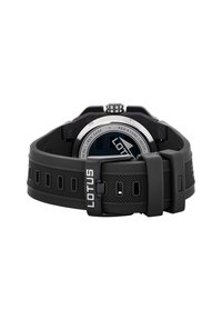 Black rubber watch with a textured strap and silver-tone hardware. Features a round case and branding on the buckle. Back view displayed.