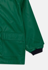 Petit Bateau JUNIOR CIRE UNISEX - Regnjakke - jardin