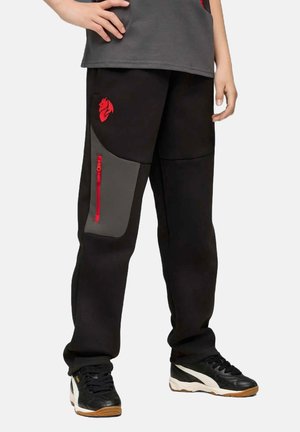 Schwarze Jogginghosen mit einer grauen Tasche, roten Reißverschlussdetails und rotem Logo. Hergestellt aus weichem Stoff, mit einem lässigen Schnitt und Bündchen an den Knöcheln.