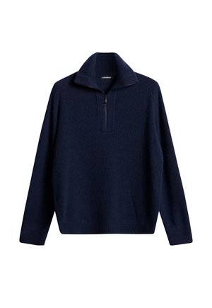 Pull en col montant bleu marine avec une texture côtelée, col à zip demi, et manches longues. Présente un design uni sans motifs ni accents.
