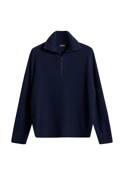 Marinblå tröja med ribbat mönster, halvdragkedja i kragen och långa ärmar. Har en enfärgad design utan mönster eller dekorationer.