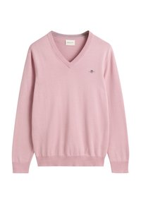 Pull rose clair à col en V manches longues, avec poignets et ourlet côtelés, avec un petit logo brodé sur le côté gauche de la poitrine.