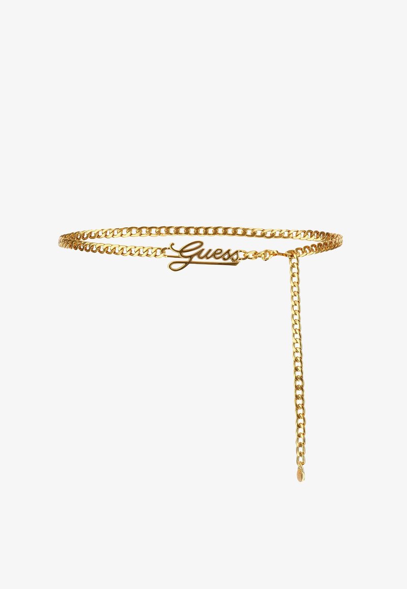 Gold chain belt featuring a dainty "Guess" logo. The design includes a two-part chain and a hanging chain detail for added effect.