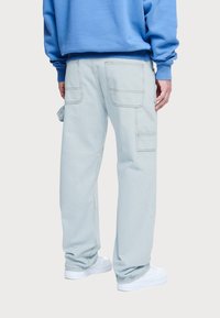Pegador DAULE BAGGY WORKWEAR - Vrečaste kavbojke - sand washed blue