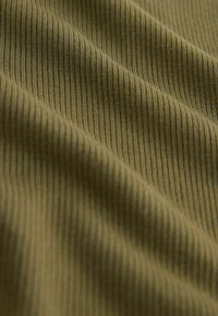 Olive green ribbed textile with a soft texture; material appears smooth with uniform ridges creating a subtle pattern across the surface.