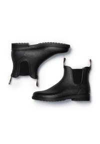 Mustat nahka nilkkurit, joissa on joustavat sivupaneelit, vetolaput ja teksturoitu kumipohja. Tyylikäs muotoilu pyöristetyllä kärjellä ja sileällä pinnalla.