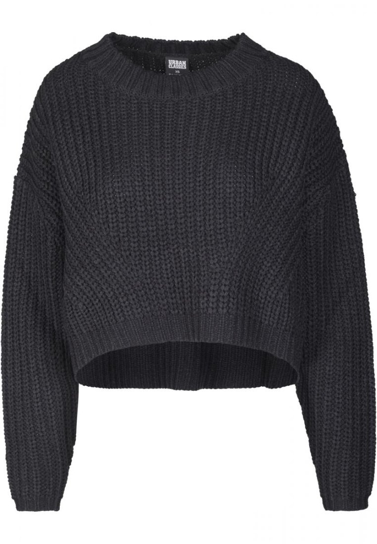 Schwarzer gestrickter Pullover mit cropped Design, Rundhalsausschnitt und weiten Ärmeln. Strukturiert Stoff mit geripptem Saum und Bündchen.