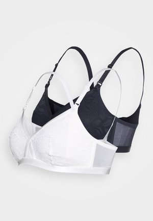 Dois soutiens: um branco com um design em renda e alças de cetim, e um preto com um tecido texturizado. Ambos apresentam alças ajustáveis e copas sem costura.