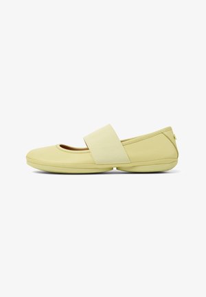 Yellow ballet flats with a wide elastic band across the upper, smooth synthetic material, rounded toe, and a low-profile sole.