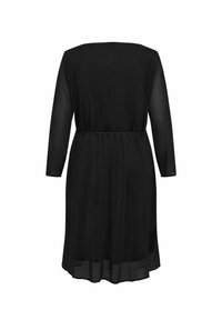Robe noire avec de longues manches transparentes, taille cintrée et jupe fluide. Tissu lisse, encolure ronde et design de dos simple.