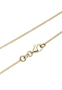 Guld kædereg necklace med en tekstureret overflade, der har en fjederlås og cirkulære enheder, som viser et overordnet slankt design.