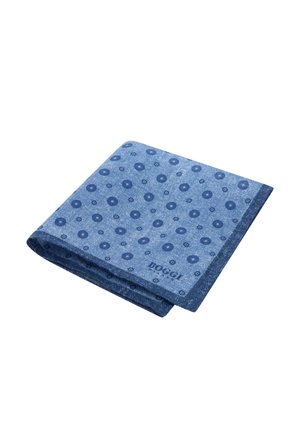Pochette bleue pliée avec des motifs circulaires bleu foncé et un logo "HOGGI" sur le bord.