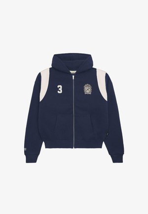 Námořnická zipová mikina vyrobená z bavlněné směsi. Obsahuje bílé ramenní akcenty, vytištěné číslo '3' a logo na levé hrudi. Zahrnuje přední kapsy.