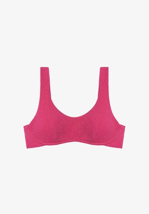 Soutien-gorge rose avec de larges bretelles et un décolleté arrondi. Fabriqué à partir d'un tissu texturé avec un léger éclat. Sans armature, conception sans coutures.
