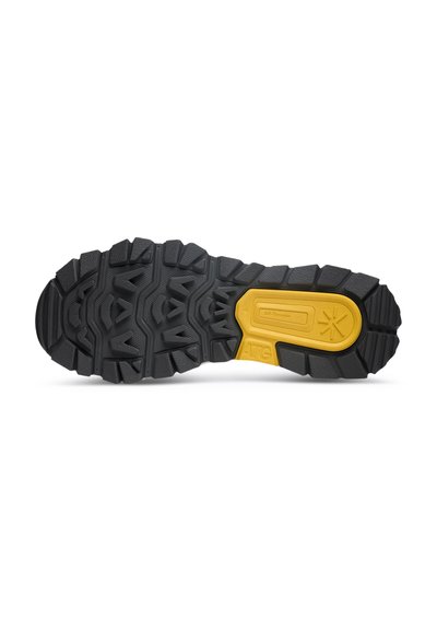Black rubber outsole with deep treads and a yellow accent area labeled "All-Terrain." Designed for grip and traction on various surfaces.