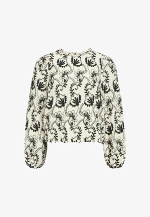 Kreemivärvi top, millel on pikad, puffunud varrukad, millel on peen must lilleline tikand ja ümmargune kaelus. Tekstuuriga kangas, millel on mugav lõige.