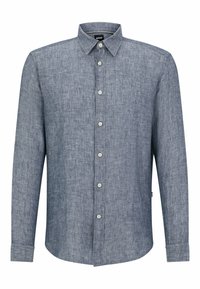 Blå långärmad skjorta med knappar, tillverkad av textil med struktur. Har en klassisk krage och framknäppning med ljusa knappar.