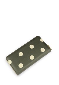Green leather wallet featuring large cream polka dots, flat rectangular shape, and a zipper closure with a gold-colored hardware accent.