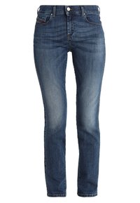 Džínové kalhoty ve tmavě modré barvě s mírně vybledlým předním dílem. Klasický pětikapsový design, prošívané detaily podél švů a zapínání na knoflík.