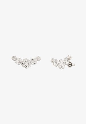 Boucles d'oreilles clous en argent avec texture martelée, présentant des groupes de cinq petits disques circulaires disposés en une ligne courbée.