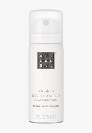 Canistre cylindrique blanc avec un capuchon blanc brillant. L'étiquette présente un texte noir et or, détaillant le produit et les ingrédients. 1,6 fl oz.