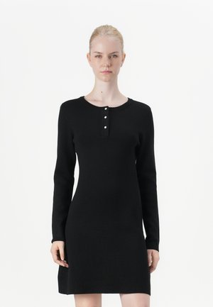 Black, long-sleeve dress with a round neckline. Features three-button placket and a fitted bodice that flares slightly at the hem. Smooth texture.