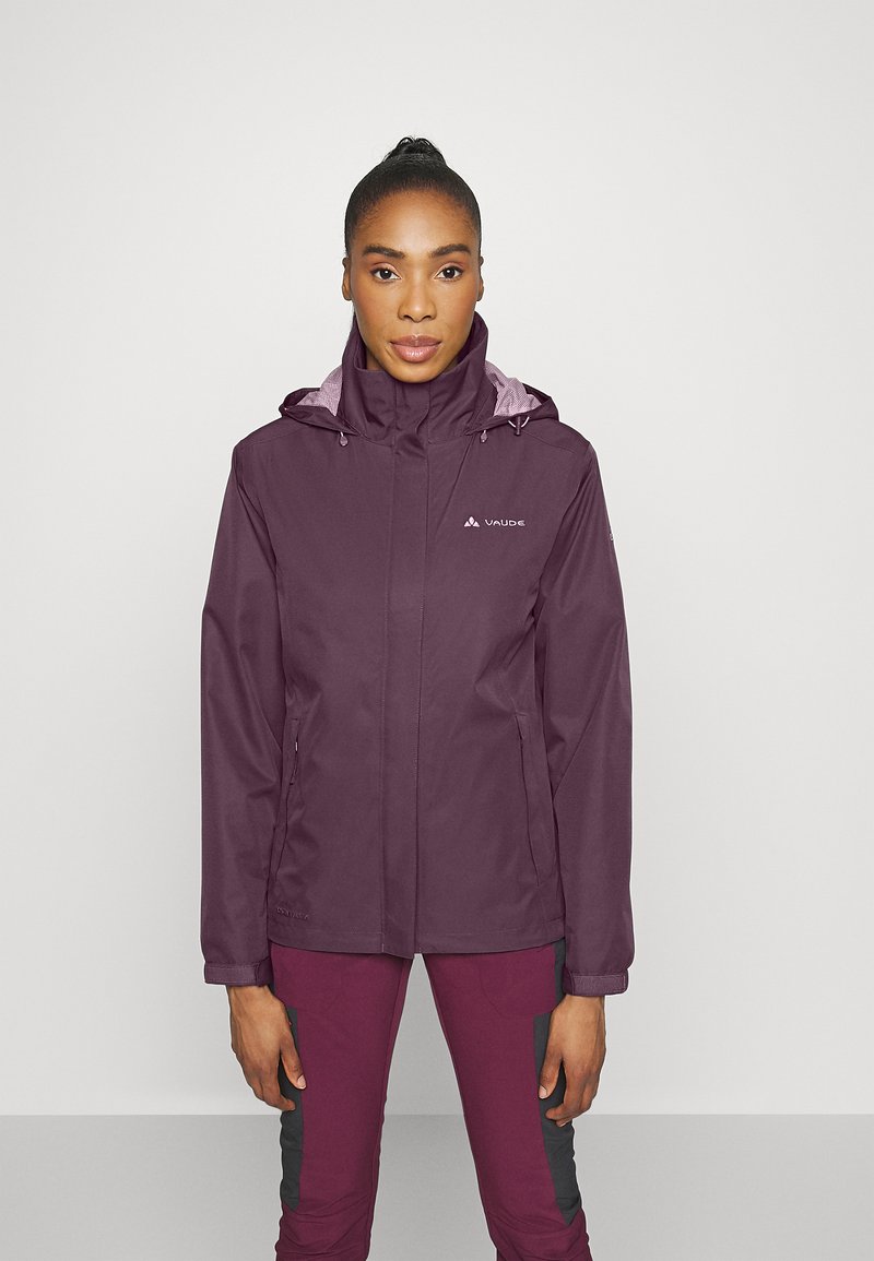 Violet waterproof jacket with a high collar and adjustable hood, featuring zippered pockets and a lined interior. Logo on the chest.