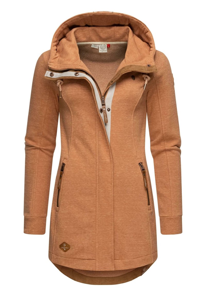 Tan hooded jacket with a zip front, two side pockets, and a longer back. Features drawstring at the hood and contrasting inner fabric.