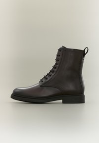 Επιλέχθηκε, dark brown