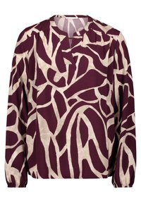 Blusa color bordeaux con un motivo astratto crema, maniche lunghe raccolte ai polsi, scollatura a V e tessuto morbido e leggero.