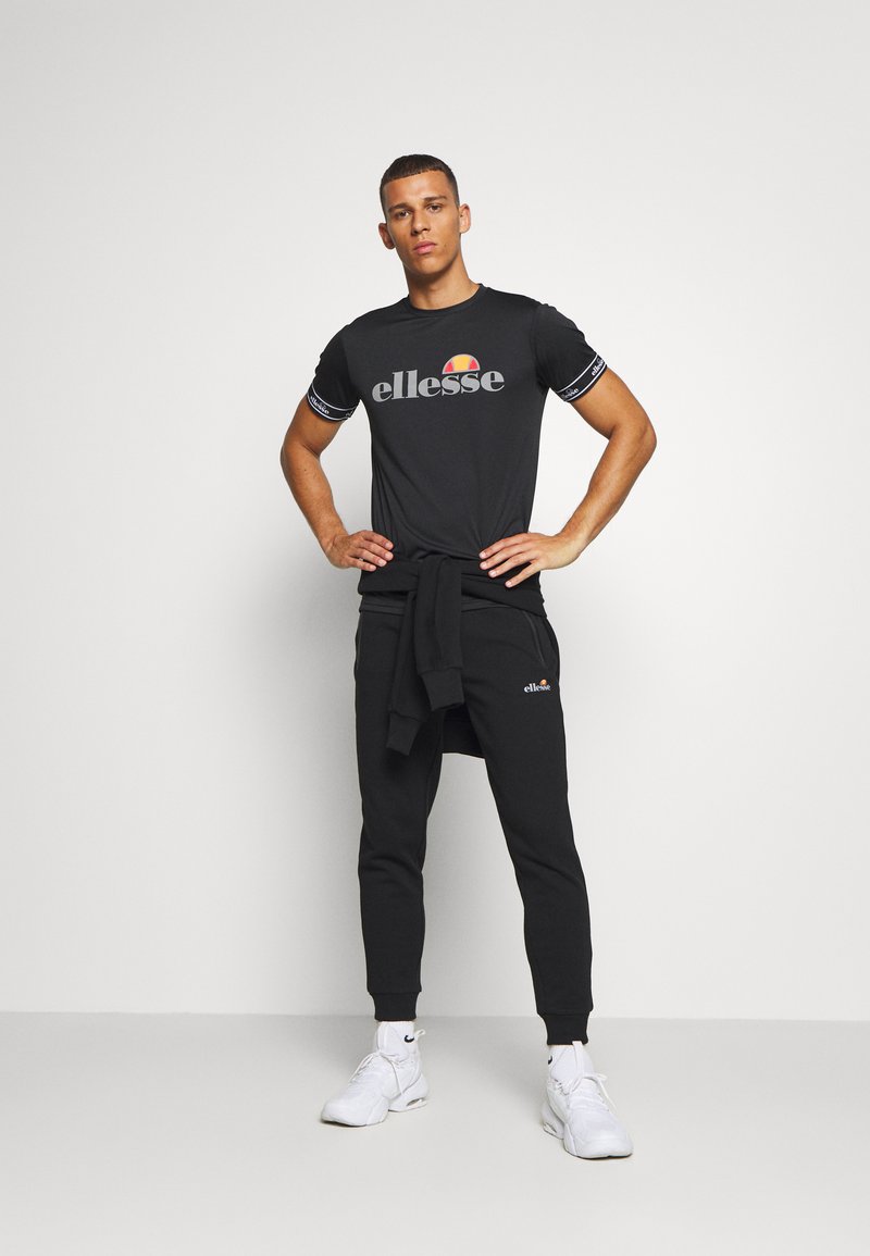 Ellesse STASERE - Trainingsbroek - black/zwart