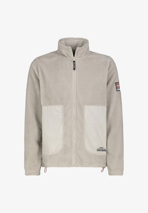 Hellbeige Fleecejacke mit durchgehendem Reißverschluss und Stehkragen, zwei großen Fronttaschen aus Stoff sowie einem Logo-Patch am linken Ärmel und am unteren Rand der Tasche.