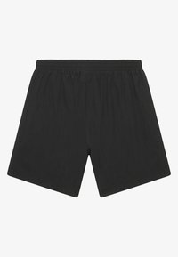 Pantaloni corti neri realizzati in tessuto leggero e liscio, con vita elastica. Senza tasche visibili o decorazioni. Forma semplice e squadrata.