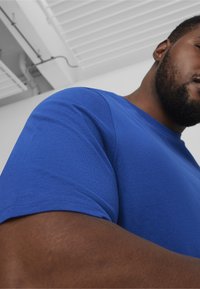 Puma BETTER ESSENTIALS TEE - T-shirts basic - glaze