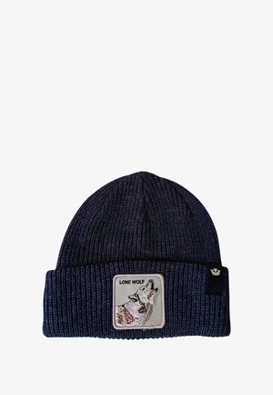 Beanie blu lavorato a maglia con texture a coste e risvolto. Presenta un patch con un lupo che ulula e il testo "LONE WOLF" sotto l'illustrazione.