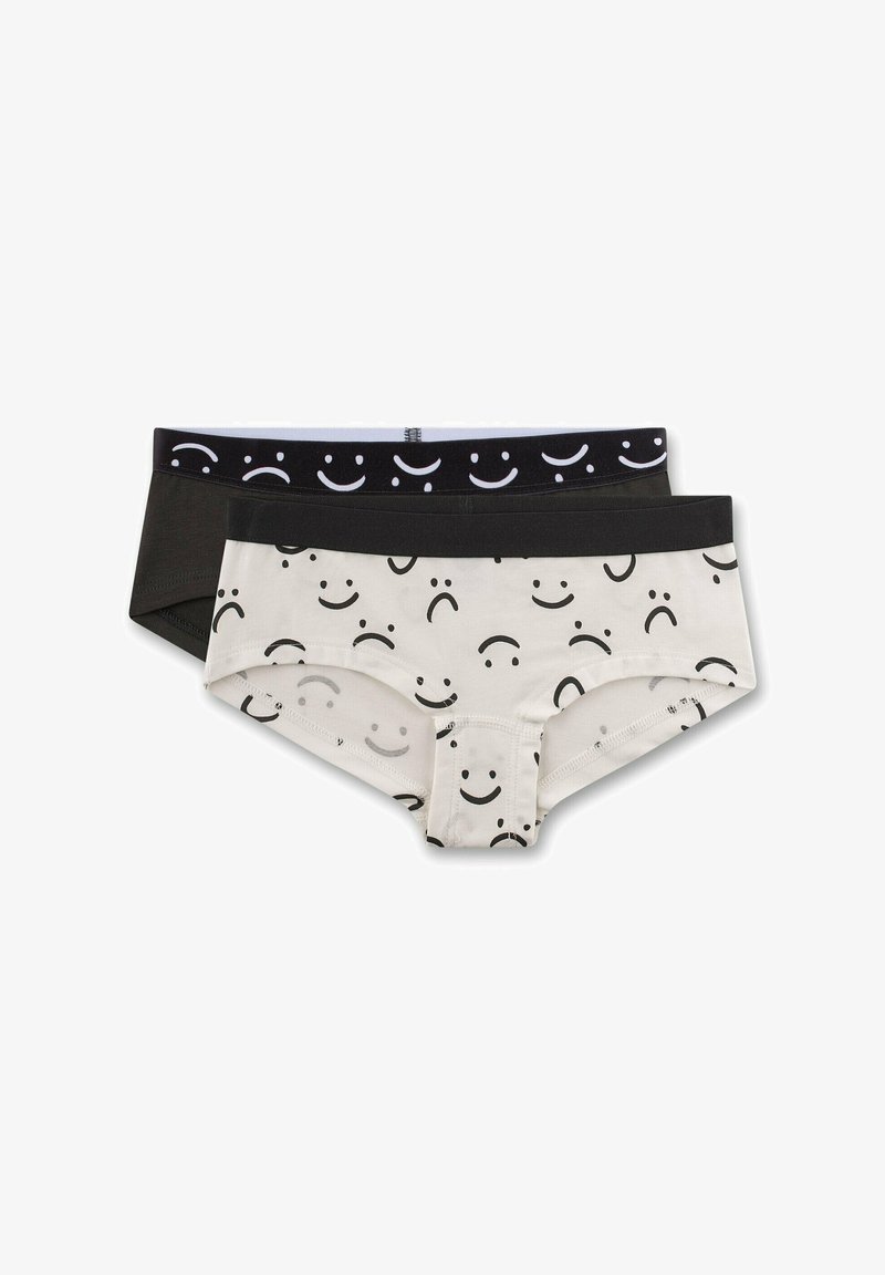 Two pairs of cotton underwear: one white with black smiley face pattern, the other solid black with a patterned waistband in white.
