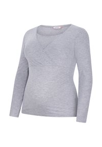 Long-sleeve wrap top in light gray, made of soft jersey material. Features a v-neck design and a curved hem for a relaxed fit.