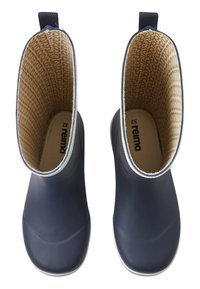 Bottes en caoutchouc navy avec un extérieur lisse, une bordure blanche contrastante autour du haut, et un intérieur beige texturé avec un motif répétitif.