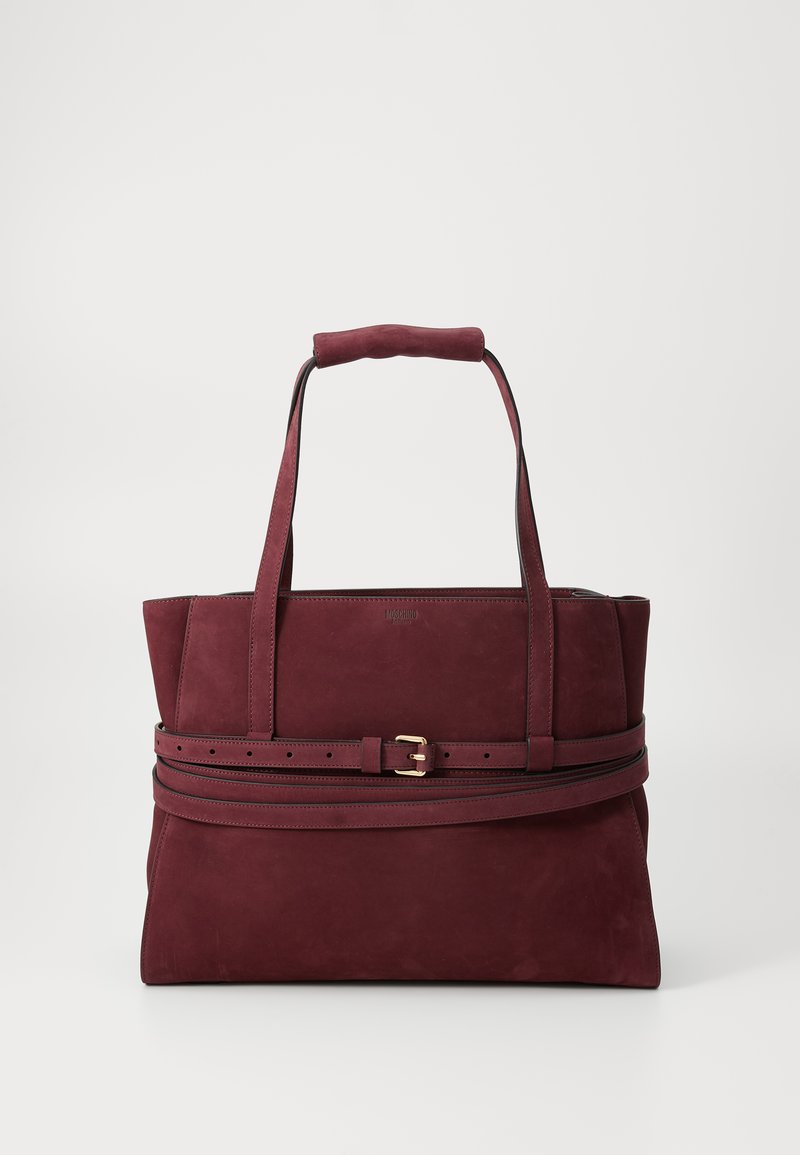 Bordó velúr válltáska strukturált dizájnnal, kettős fogantyúval, csat díszítéssel és sima textúrával. Ideális napi használatra.