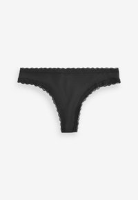 String noir en tissu lisse avec une bordure en dentelle florale le long de la taille et des ouvertures de jambe, présentant un design minimaliste.