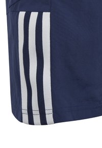 Navy shorts featuring three horizontal white stripes along the side, made of a lightweight fabric with a smooth texture.