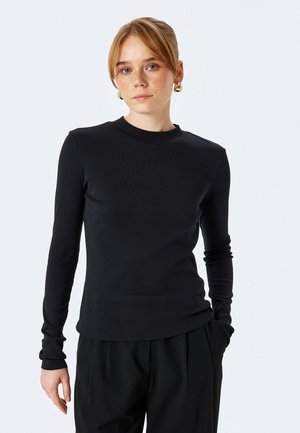 Långärmad tröja - black
