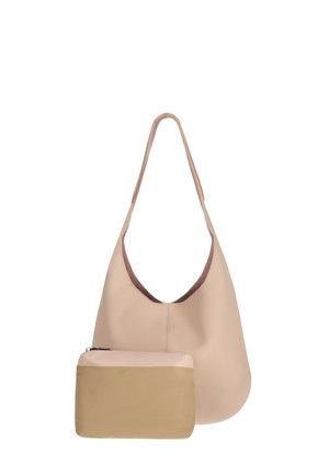 Beige Leder-Umhängetasche mit einem einzelnen Riemen und einer kleinen passenden beige-braunen Reißverschlusstasche vorne.