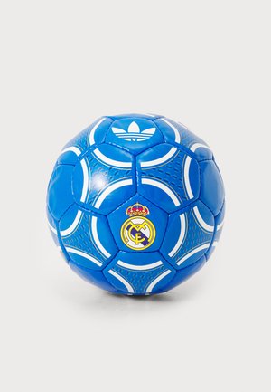 Blue soccer ball featuring a textured surface, white accents, Adidas logo, and Real Madrid emblem with a crown. Hexagonal panel design.